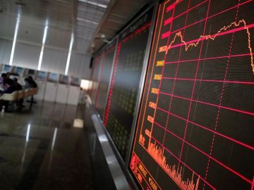 Los mercados de la China continental se desploman al volver a cotizar