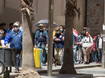 Colas en el comedor social, Reina de la Paz en el barrio del Raval