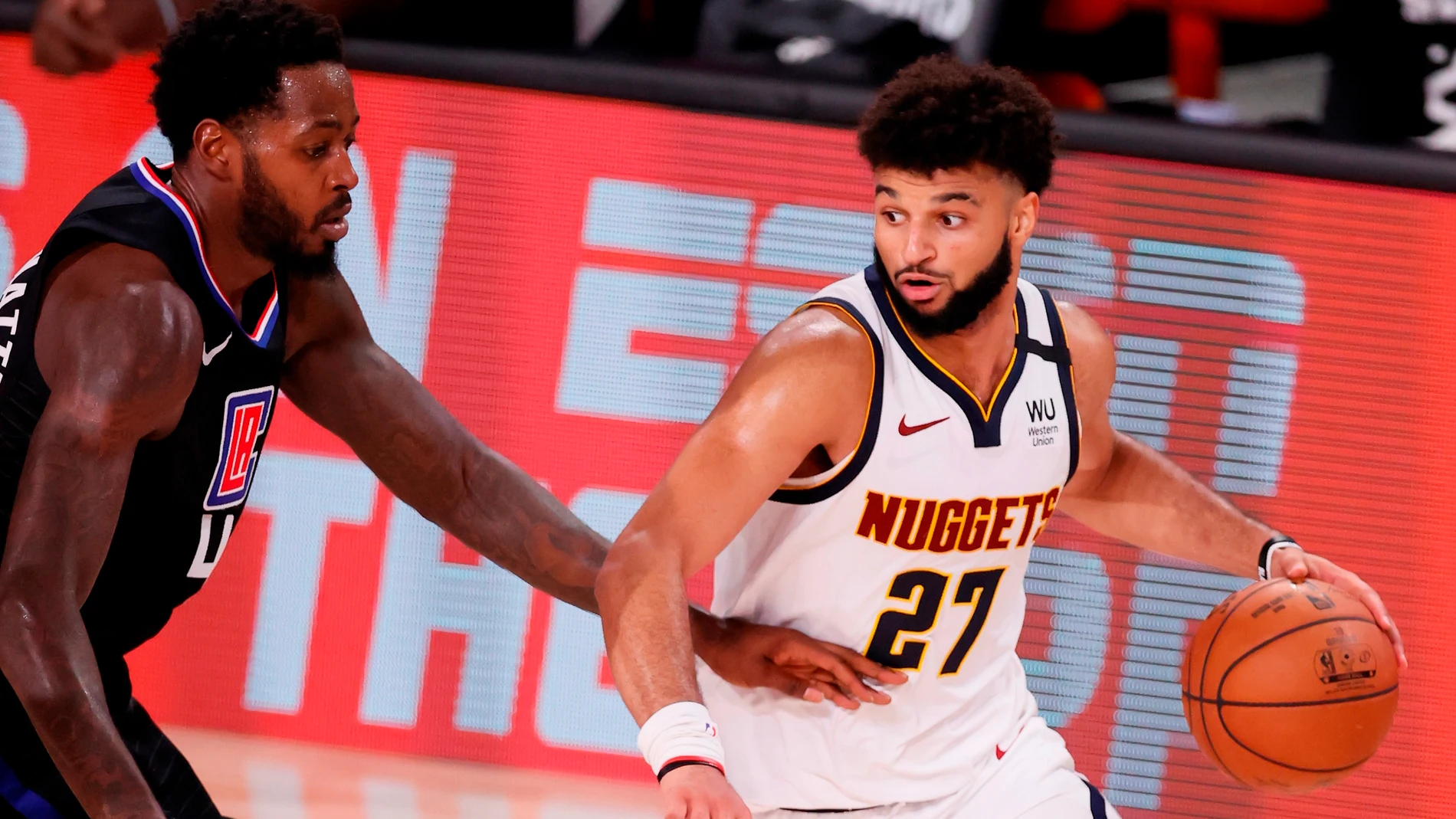 Jamal Murray, en un partido en la burbuja de la NBA en Orlando Jamal Murray, en un partido en la burbuja de la NBA en Orlando