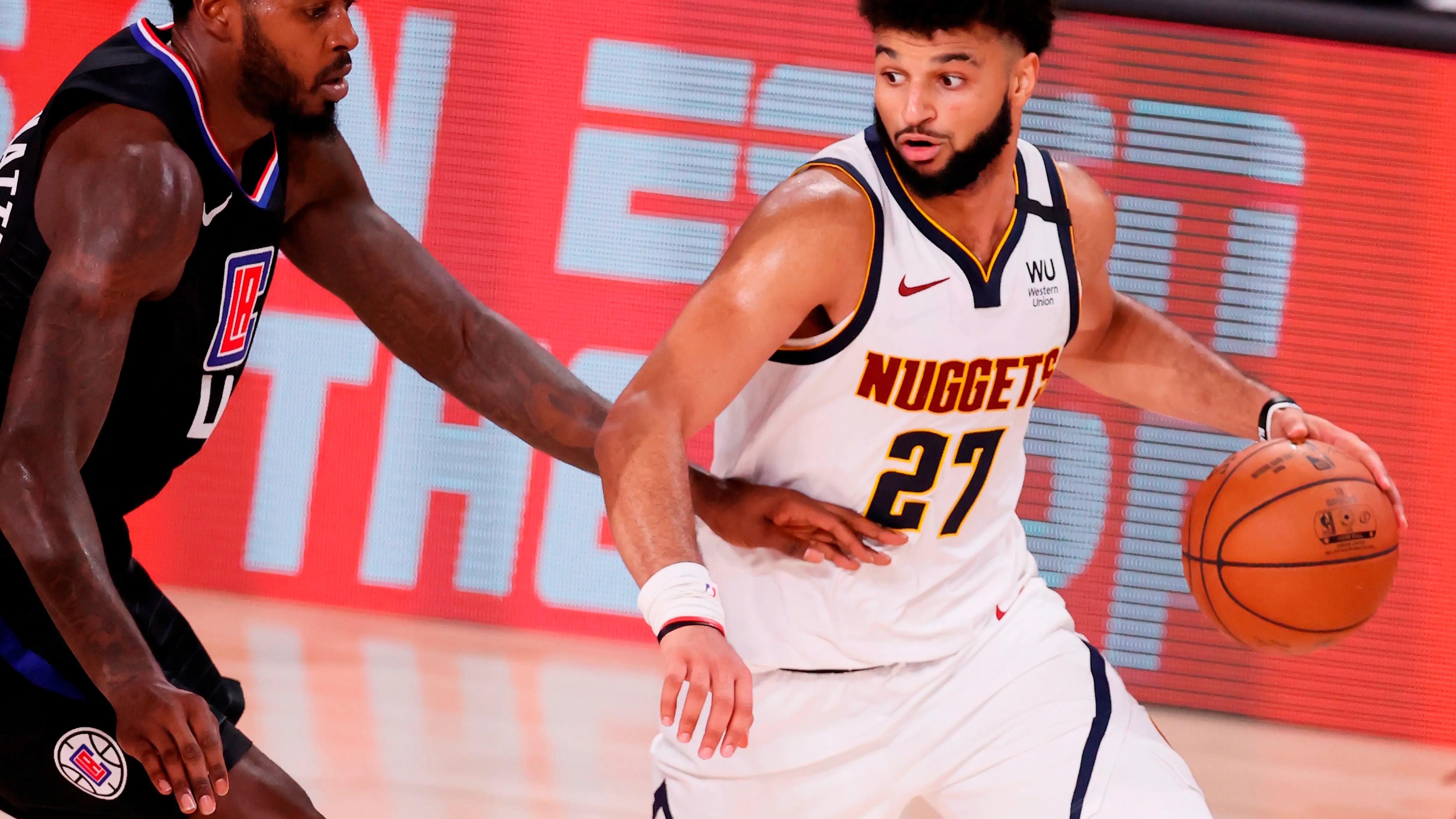 Jamal Murray, en un partido en la burbuja de la NBA en Orlando Jamal Murray, en un partido en la burbuja de la NBA en Orlando
