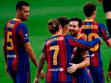 Los jugadores del Barcelona celebran el gol de Griezmann