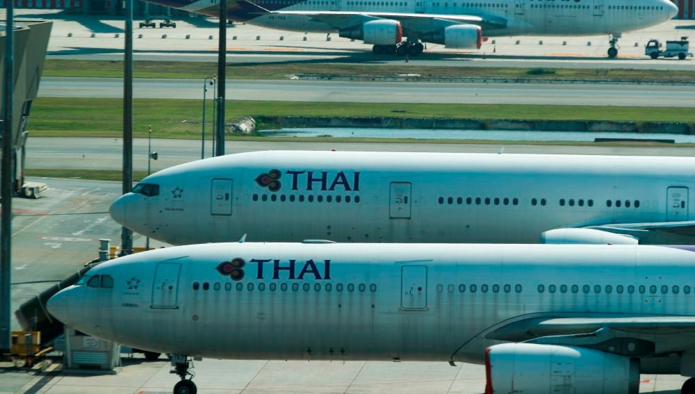 Aviones de Thai Airways, en un aeropuerto