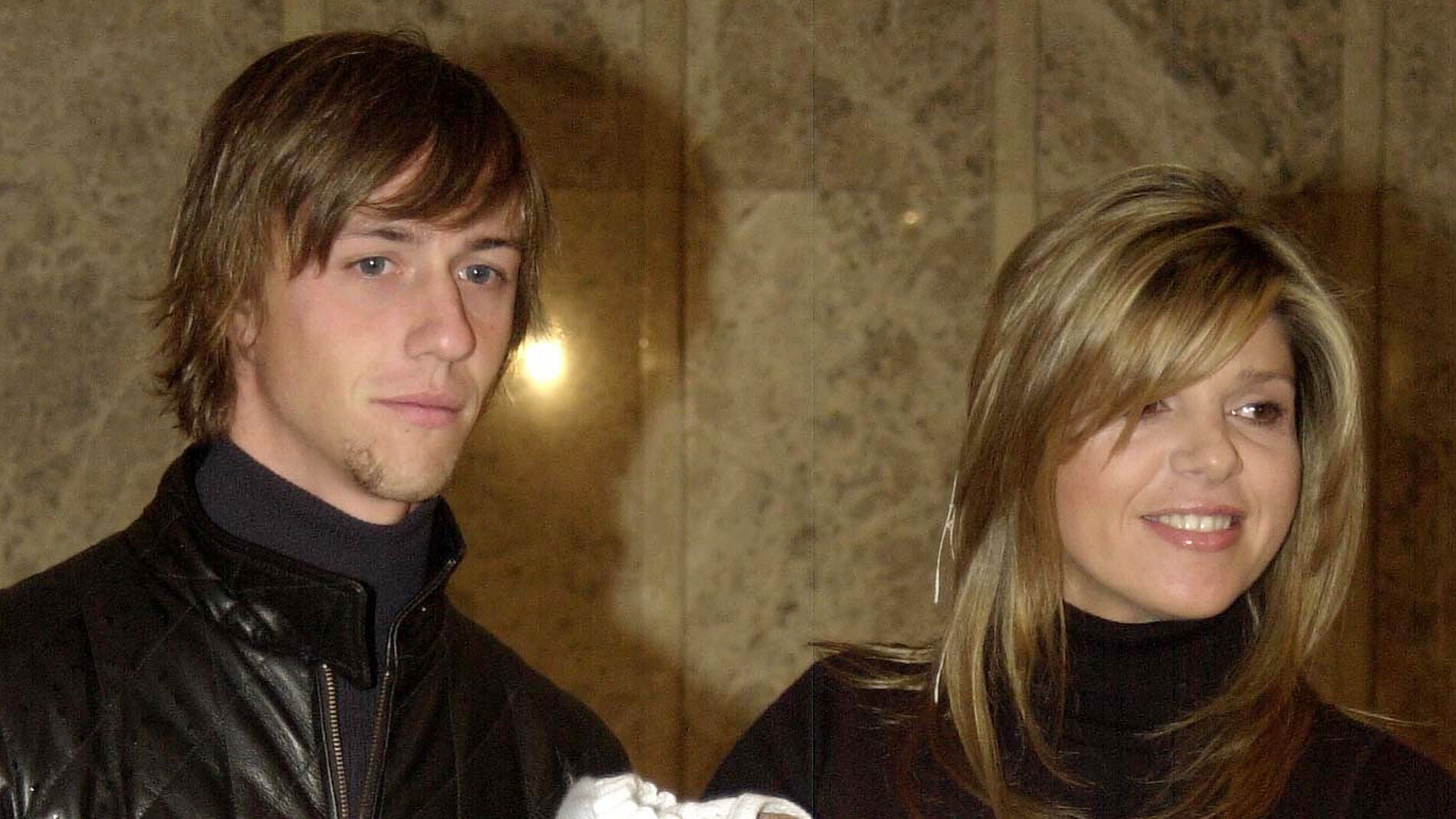 Arancha de Benito y Guti con su hijo Aitor