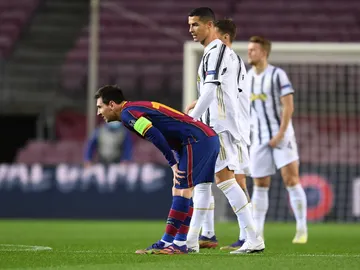 Cristiano Ronaldo y Leo Messi, en el partido de Champions Cristiano Ronaldo y Leo Messi, en el partido de Champions