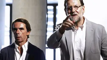 Jose María Aznar (izquierda) y Mariano Rajoy