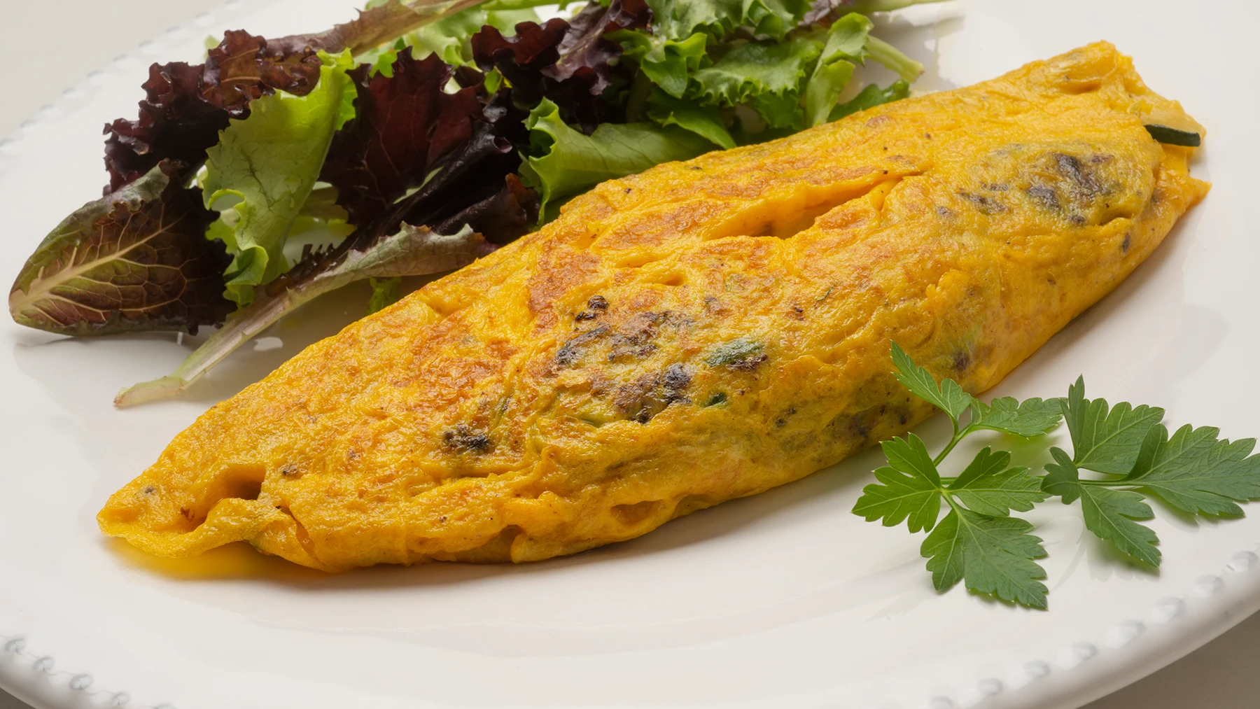 Receta jugosa de Argui&ntilde;ano: tortilla de calabac&iacute;n y morcilla