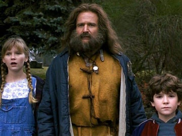 Robin Williams, Kirsten Dunst y Bradley Pierce en 'Jumanji'