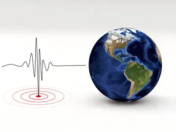 Bola del mundo con una gráfica sísmica. Bola del mundo con una gráfica sísmica.
