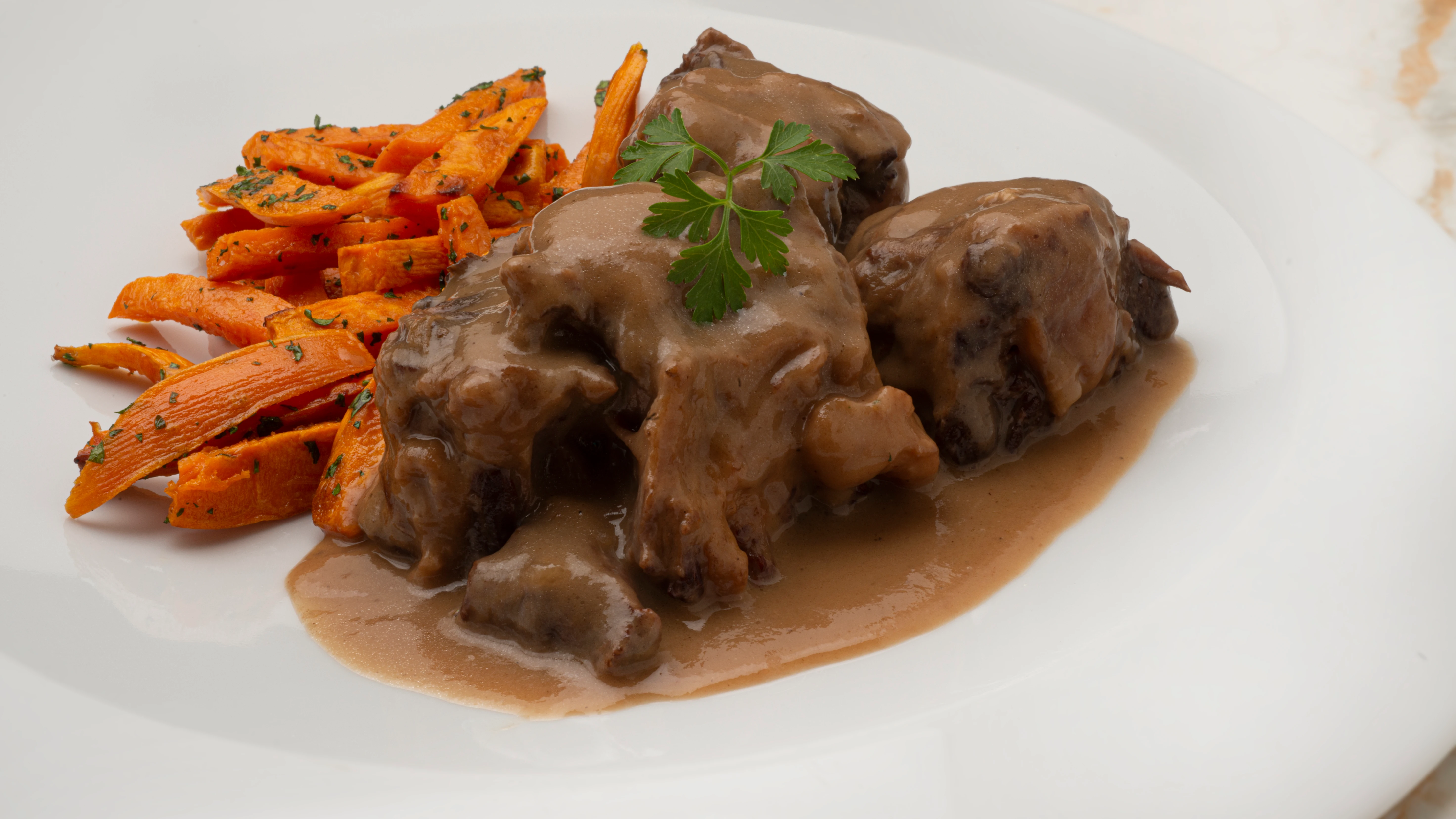 Rabo en salsa con boniato