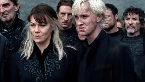 Helen McCrory y Tom Felton Helen McCrory y Tom Felton
