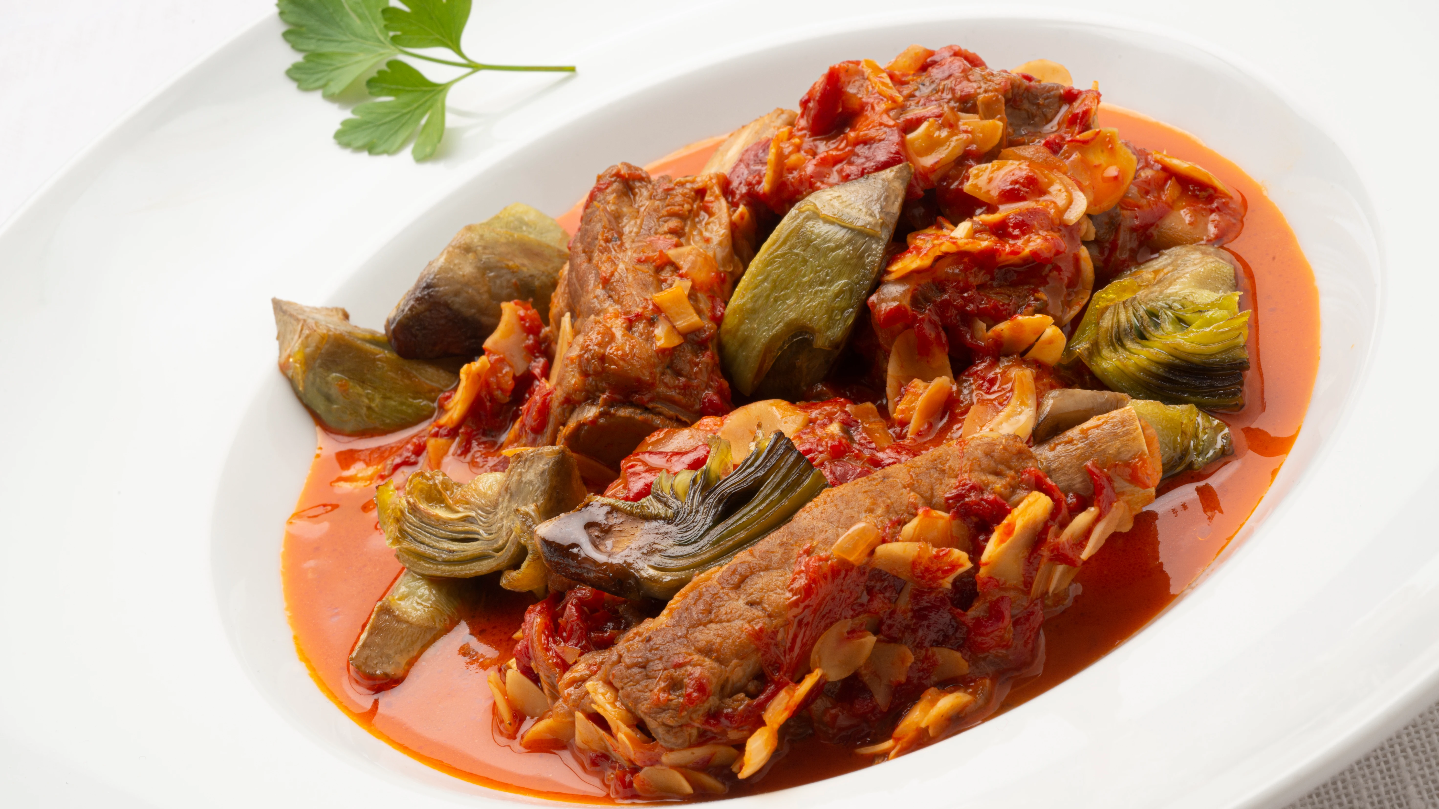 Receta "con toque": costilla guisada con choriceros y alcachofas