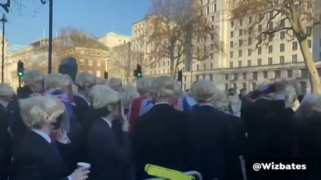 Dozens of people demonstrated dressed as Boris Johnson in protest at parties during confinement