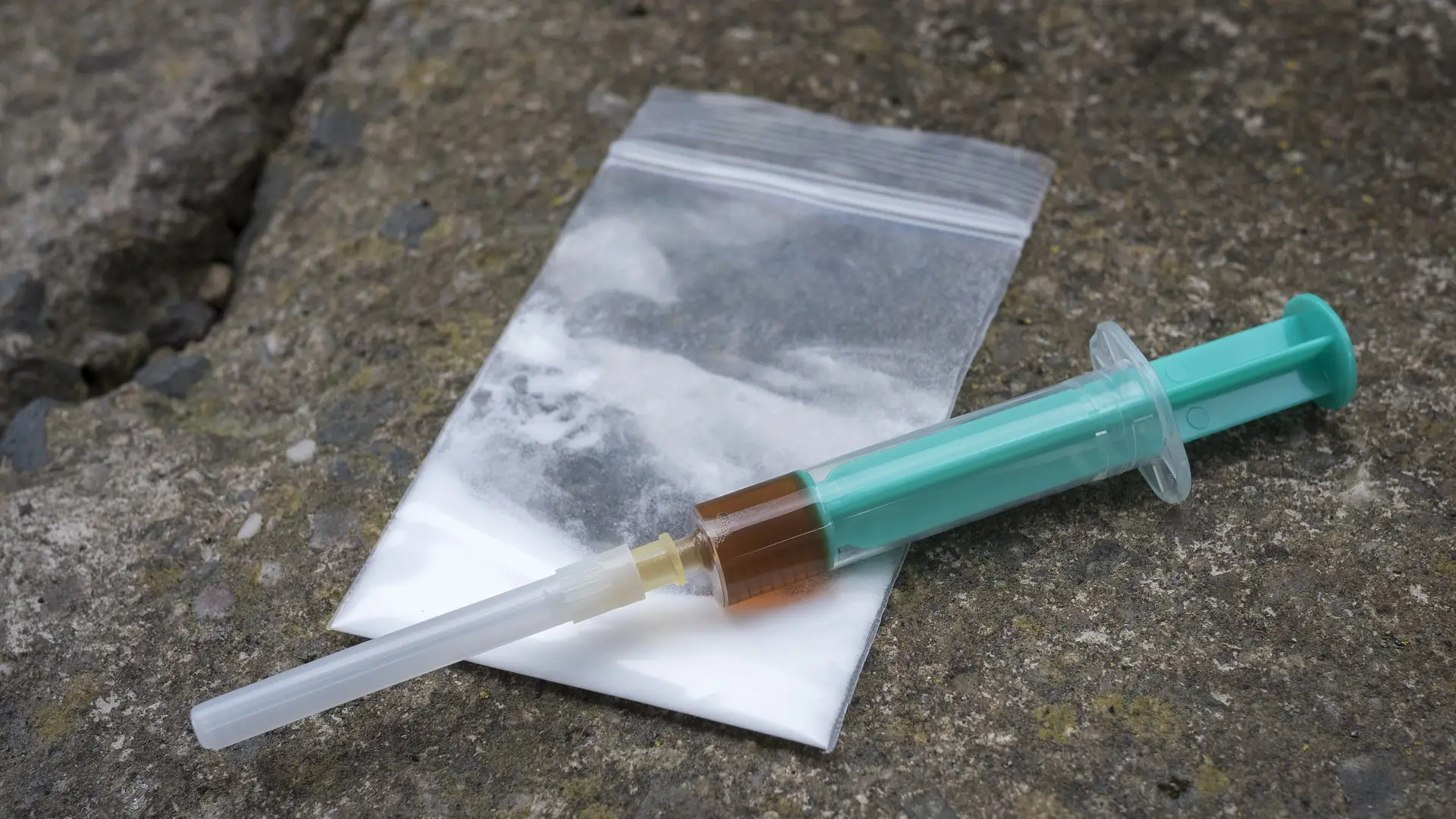 Inyección y bolsa de droga Inyección y bolsa de droga