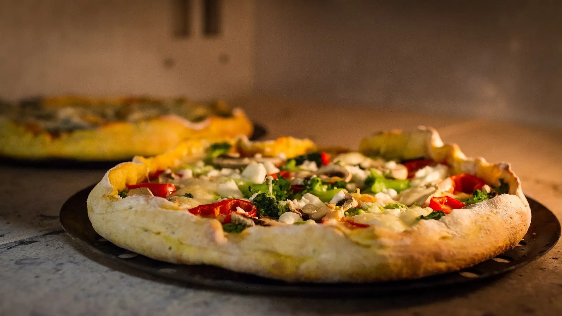 Dos pizzas en el horno Dos pizzas en el horno