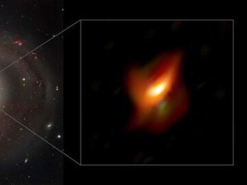 Hallado un agujero negro supermasivo en el interior de un anillo de polvo cósmico