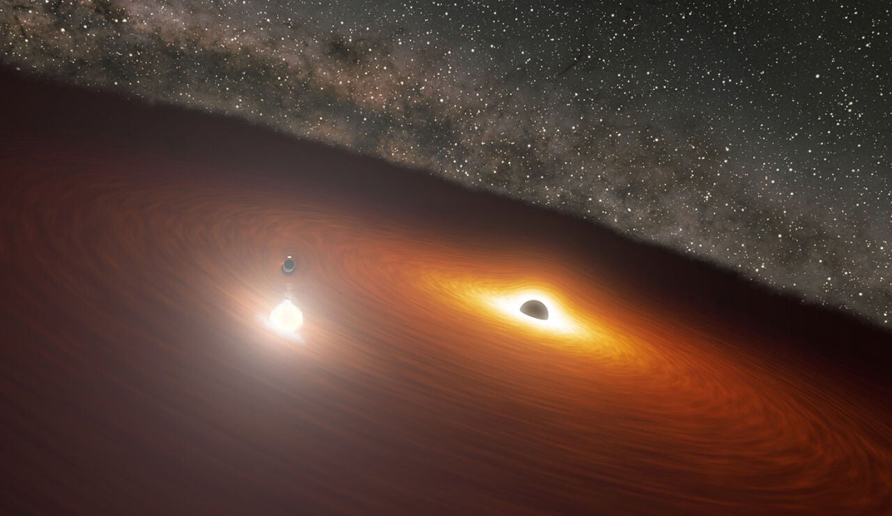 Concepci&oacute;n art&iacute;stica del sistema binario de agujeros negros en la galaxia OJ 287. 