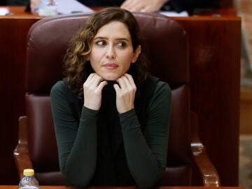 La presidenta de la Comunidad de Madrid, Isabel Díaz Ayuso, durante el pleno de la Asamblea de Madrid, este jueves