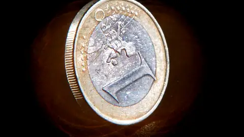 Imagen de archivo de una moneda de euro Imagen de archivo de una moneda de euro