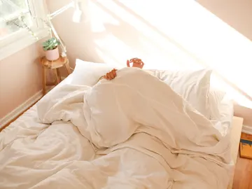 Cama con edredón Cama con edredón