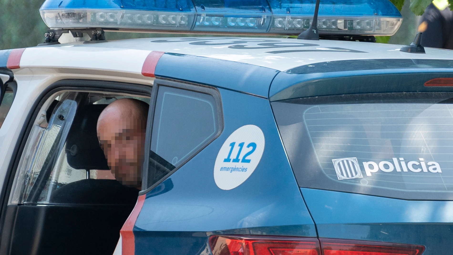 El detenido por el asesinato de su madre en un coche de los Mossos d'Esquadra El detenido por el asesinato de su madre en un coche de los Mossos d'Esquadra