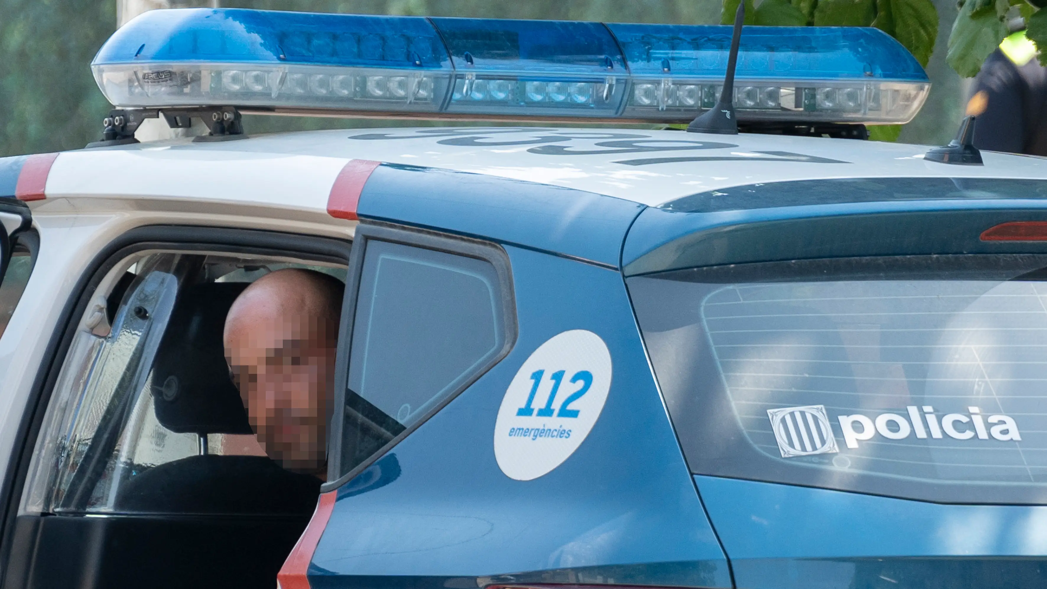 El detenido por el asesinato de su madre en un coche de los Mossos d'Esquadra El detenido por el asesinato de su madre en un coche de los Mossos d'Esquadra