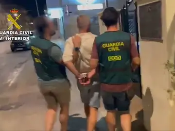 El momento de la detención del delincuente El momento de la detención del delincuente