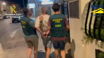 El momento de la detención del delincuente El momento de la detención del delincuente