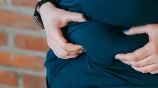 Una mujer con sobrepeso Una mujer con sobrepeso