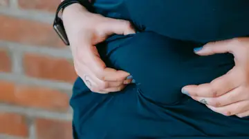 Una mujer con sobrepeso Una mujer con sobrepeso