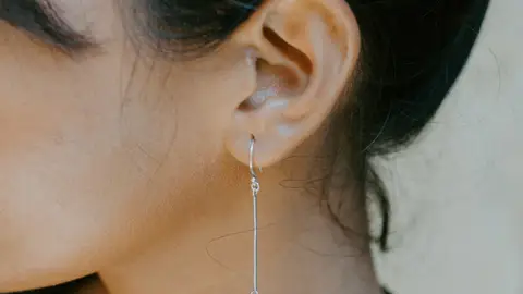 Orejas con pendientes Orejas con pendientes