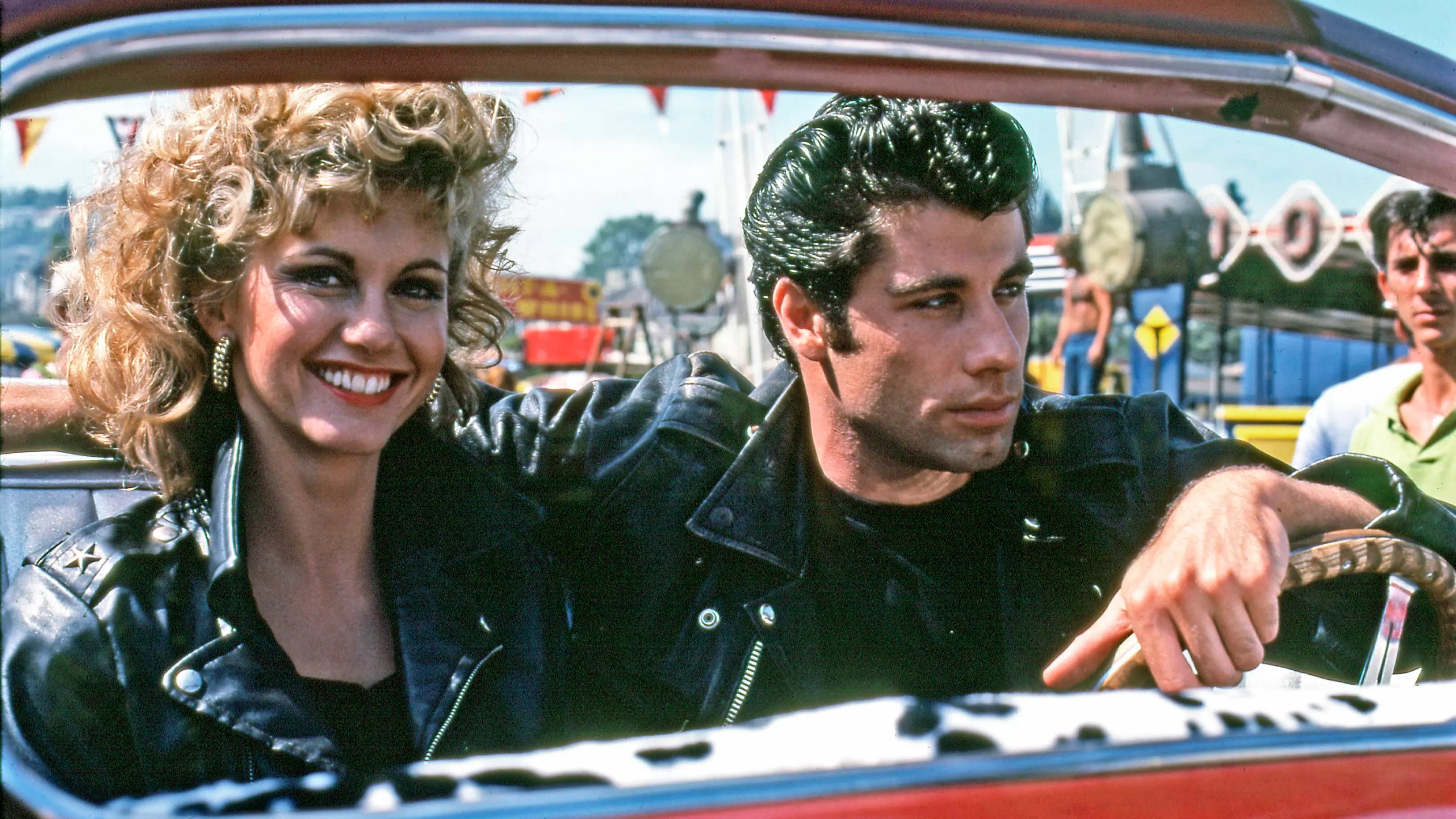 Olivia Newton-John y John Travolta como Sandy y Danny Zuko en 'Grease' Olivia Newton-John y John Travolta como Sandy y Danny Zuko en 'Grease'