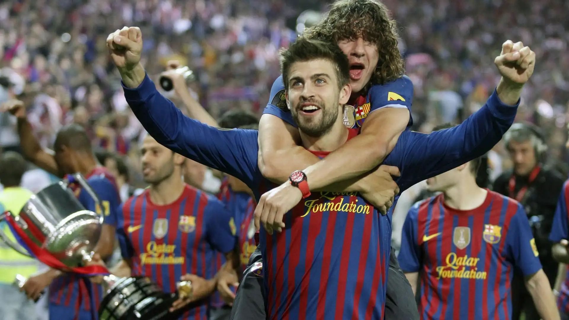 Piqué y Puyol, compañeros y amigos en el Barça Piqué y Puyol, compañeros y amigos en el Barça