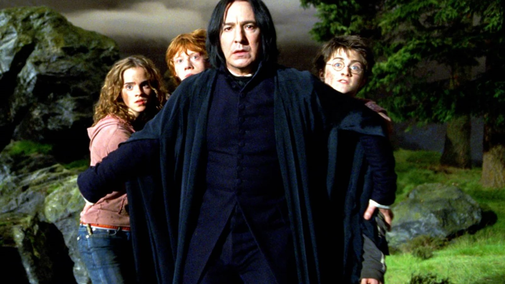 Alan Rickman con los j&oacute;venes protagonistas de 'Harry Potter'