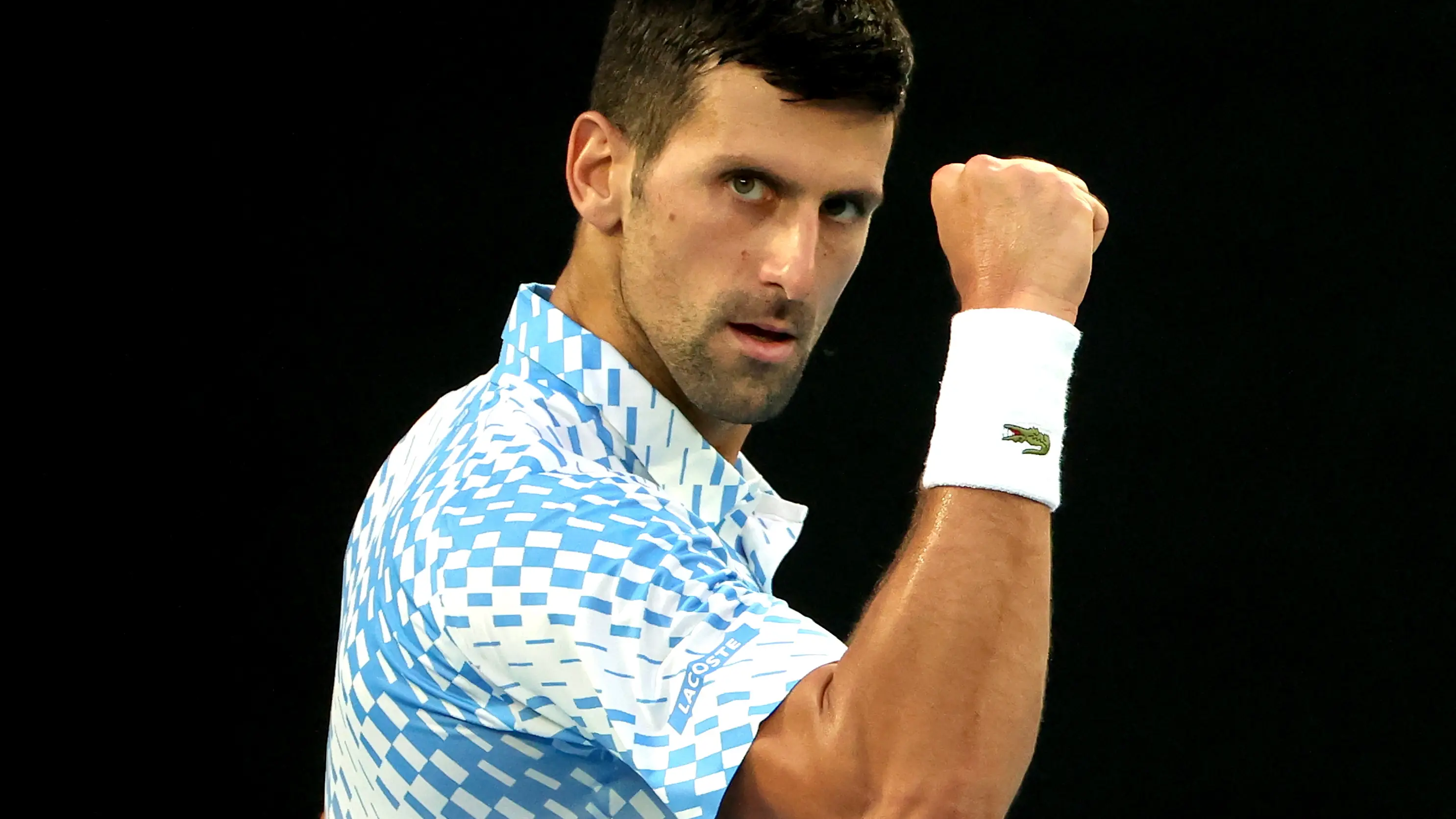 Novak Djokovic celebra un punto en el Open de Australia Novak Djokovic celebra un punto en el Open de Australia