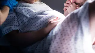 Una mujer de parto Una mujer de parto