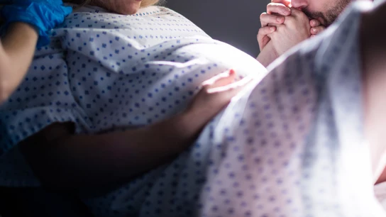 Una mujer de parto Una mujer de parto