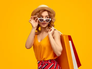 Una mujer de compras Una mujer de compras