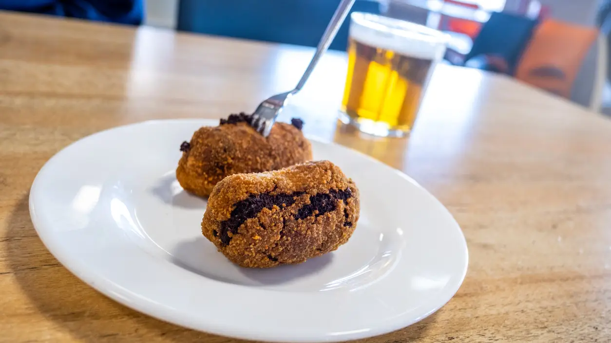 Tapa de croquetas en un restaurante