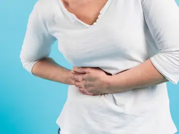 Una mujer con dolor Una mujer con dolor