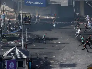 Palestinos huyendo de los ataques de Israel Palestinos huyendo de los ataques de Israel