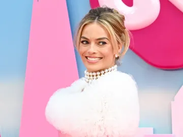 Margot Robbie como Barbie Margot Robbie como Barbie