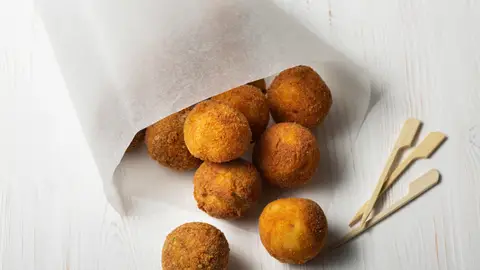 Una ración de croquetas Una ración de croquetas