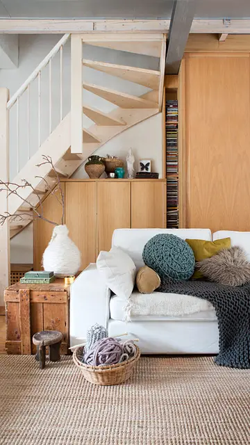 Salón con un sofá Salón con un sofá