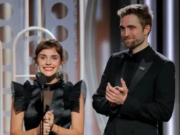 Emma Watson y Robert Pattinson se reencuentran en los Globos de Oro Emma Watson y Robert Pattinson se reencuentran en los Globos de Oro