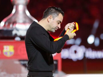 Xavi, cabizbajo tras la final de la Supercopa