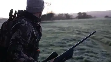 Cazador, imagen de archivo Cazador, imagen de archivo