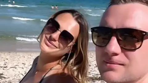 Konstantin Koltsov junto a Sabalenka Konstantin Koltsov junto a Sabalenka