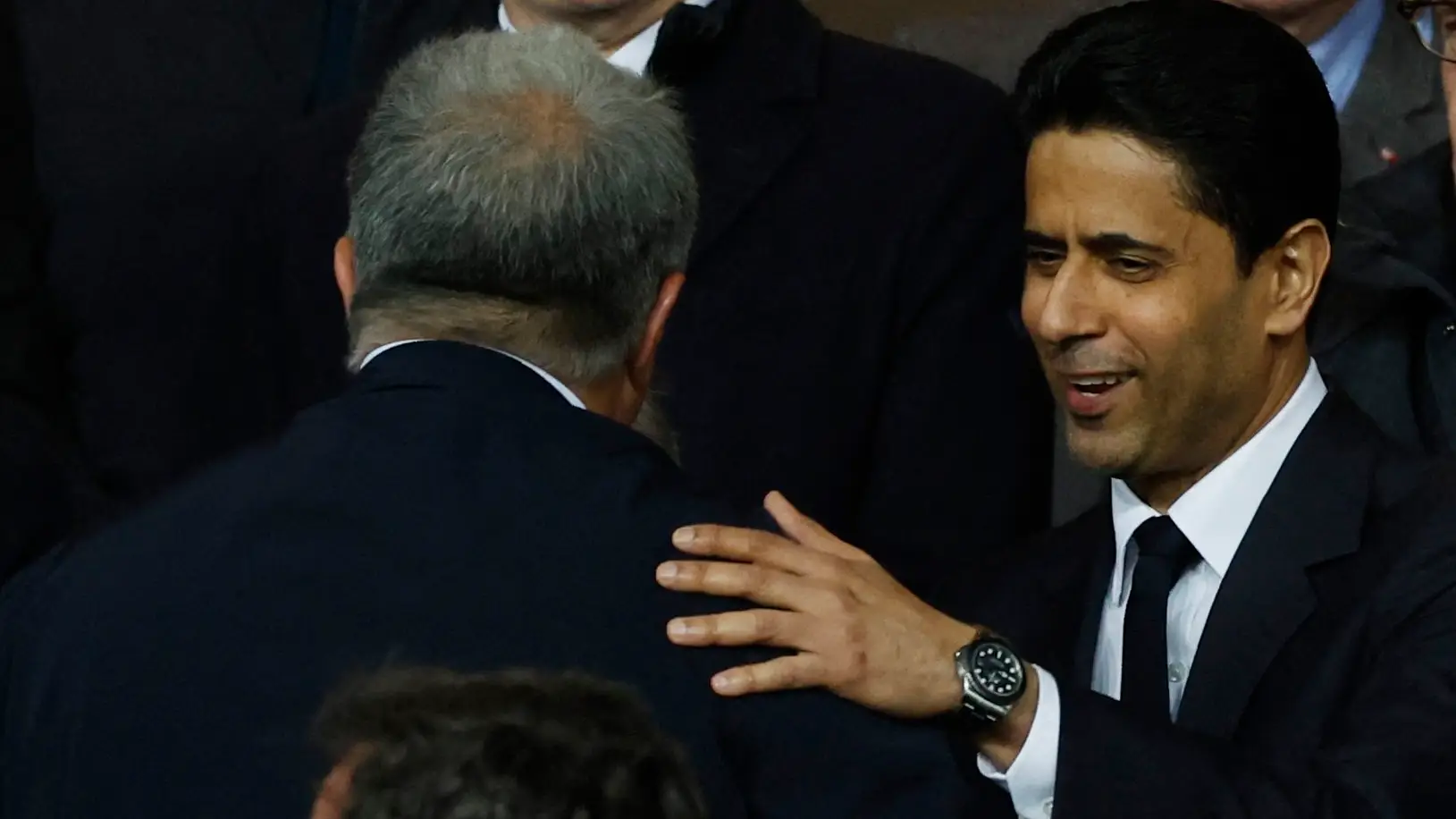 Al-Khelaifi saluda a Laporta en Montjuic