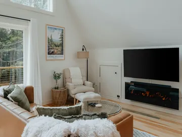 Salón con televisor Salón con televisor