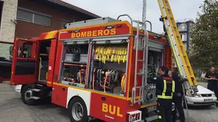 Imagen de archivo de un coche de bomberos Imagen de archivo de un coche de bomberos